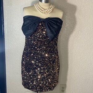 Glamorous Strapless Sequin Dress with Bow Accent